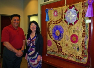 Mayor Sonny Dhaliwal picked a quilt titled “Kaleidoscope Garden” by Donna Gephardt as the newest addition to the Joyce Gatto Art Gallery.